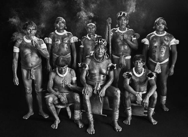 Eight almost naked shamans.